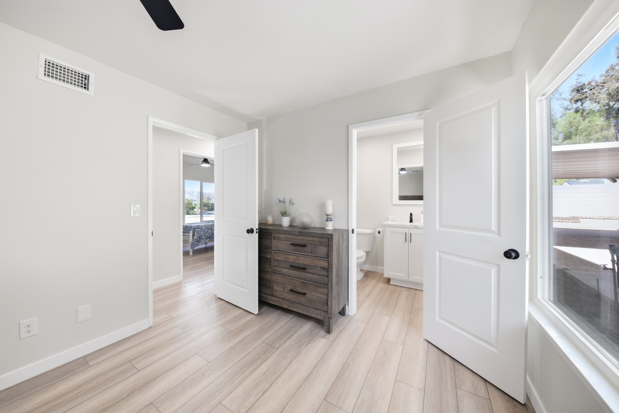Primary bathroom with stone tile