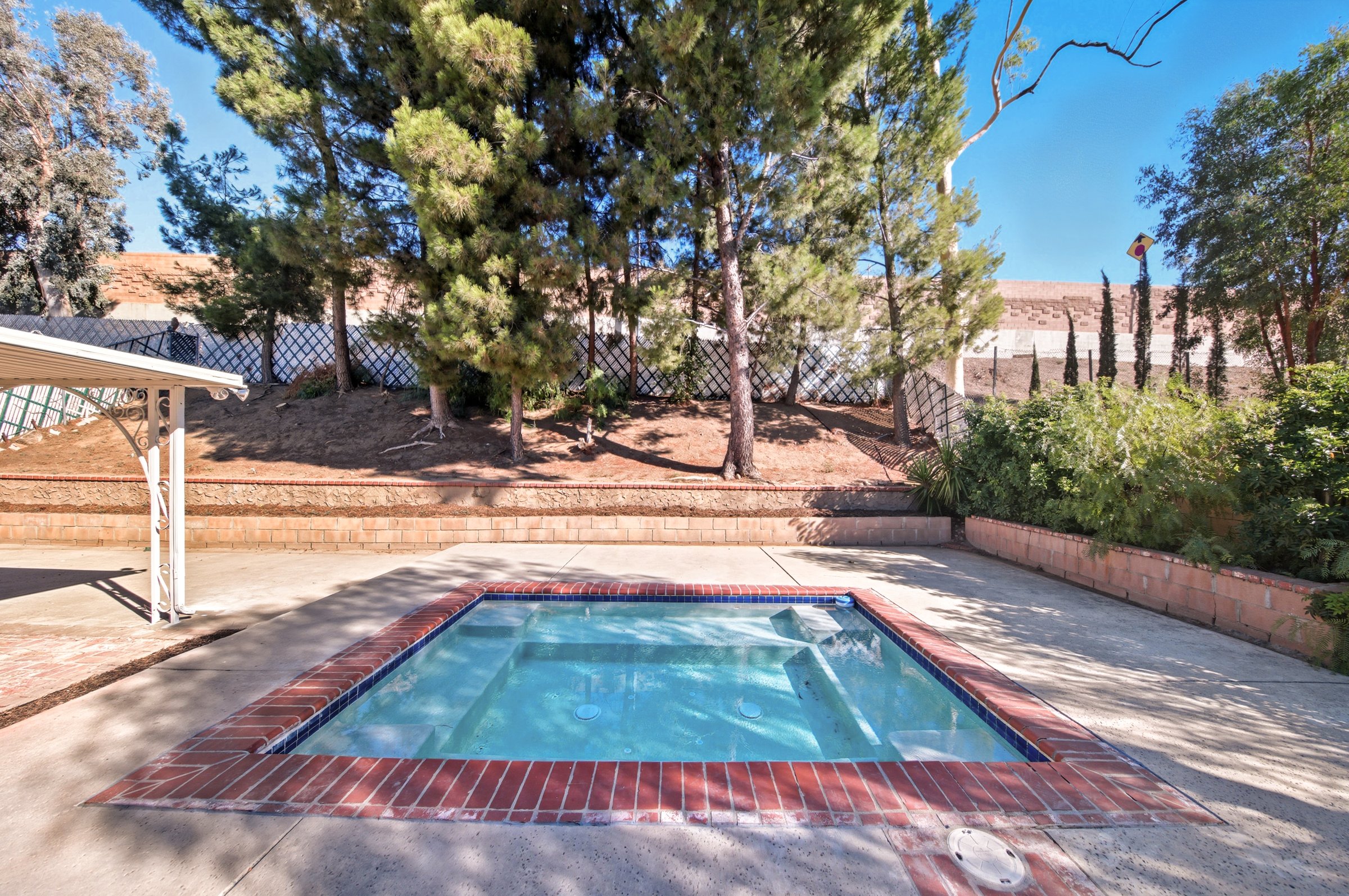 Backyard concrete and spa